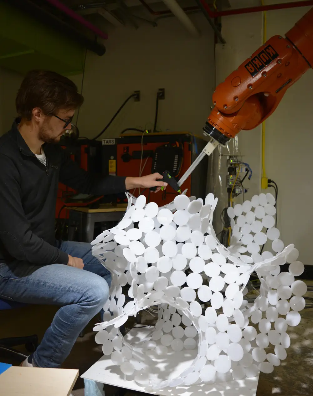 Cooperative Robotics Assembly; Assmbling the gyroid one piec at a time was rewarding but very time consuming. Jonathan Malott, Austin Texas Architecture